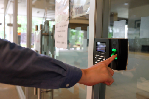 finger print lock security system with a green light placed in a shopping mall